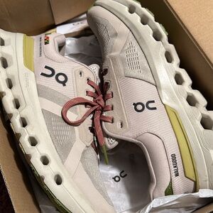 On Running Women’s Cream and Olive Sneakers